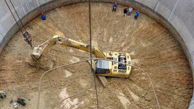 沉井式地下圆筒形立体停车库是如何建成的？
